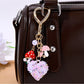 Close-up of sparkling rhinestone heart keychain showing detailed stones