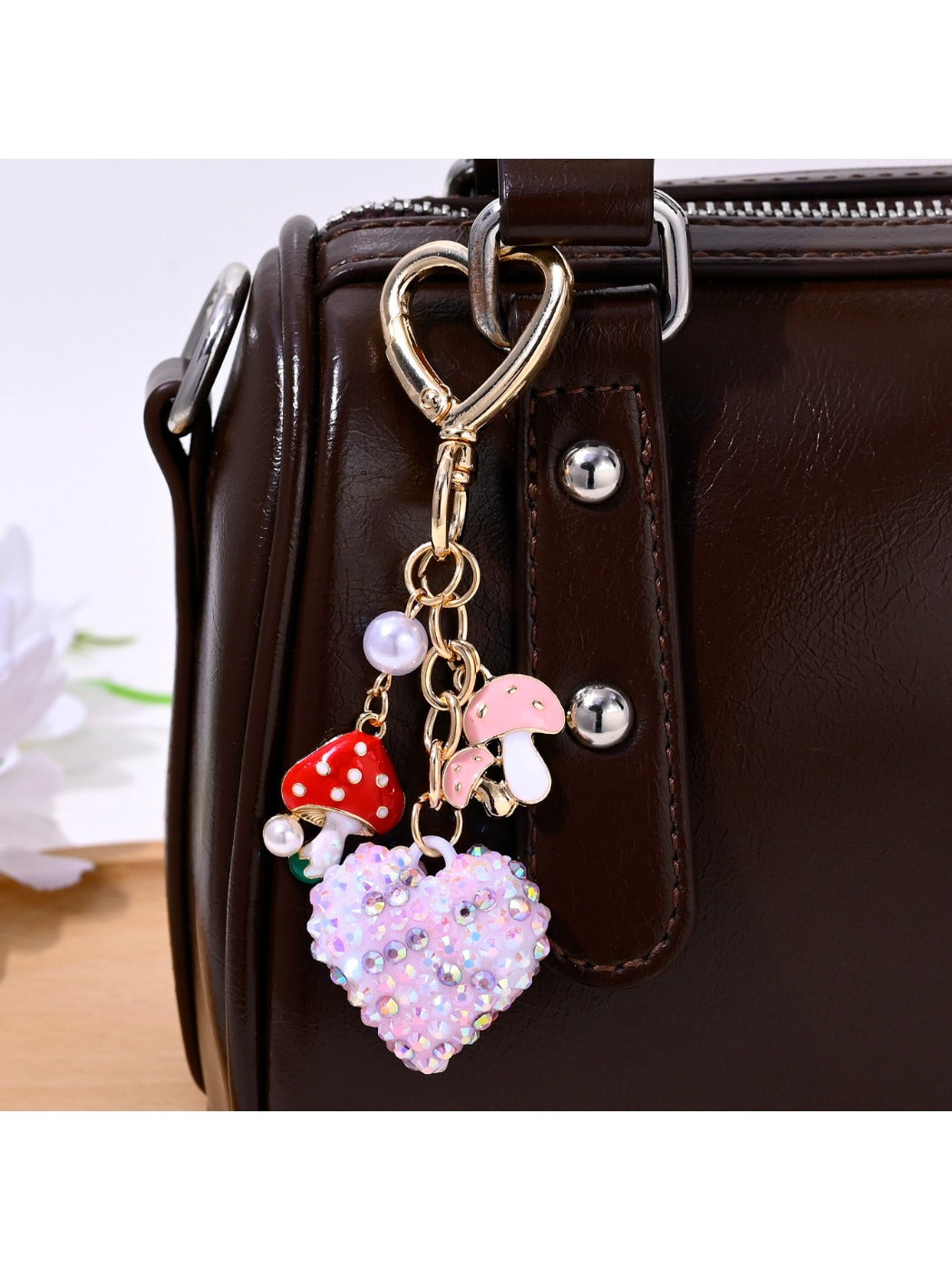 Close-up of sparkling rhinestone heart keychain showing detailed stones