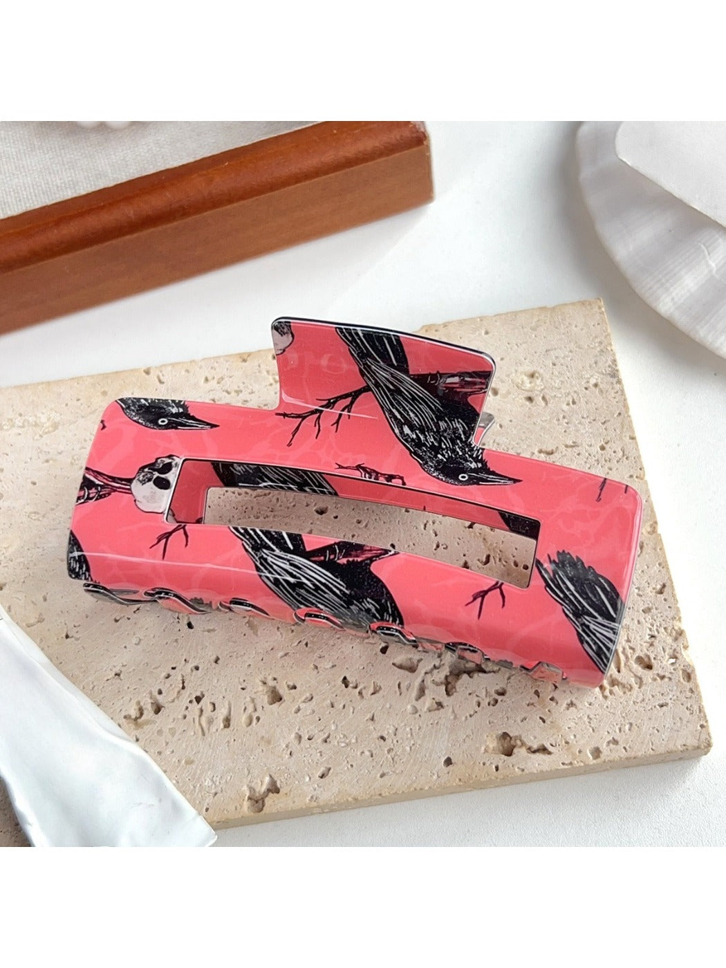 Beau hair claw clip styled in hair demonstrating secure hold and crow pattern