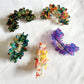 Beau Wave Cloud Shaped Claw Clip held in hand displaying size and shape