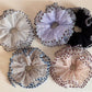 Gifty tulle scrunchie showing layered color block design and soft texture