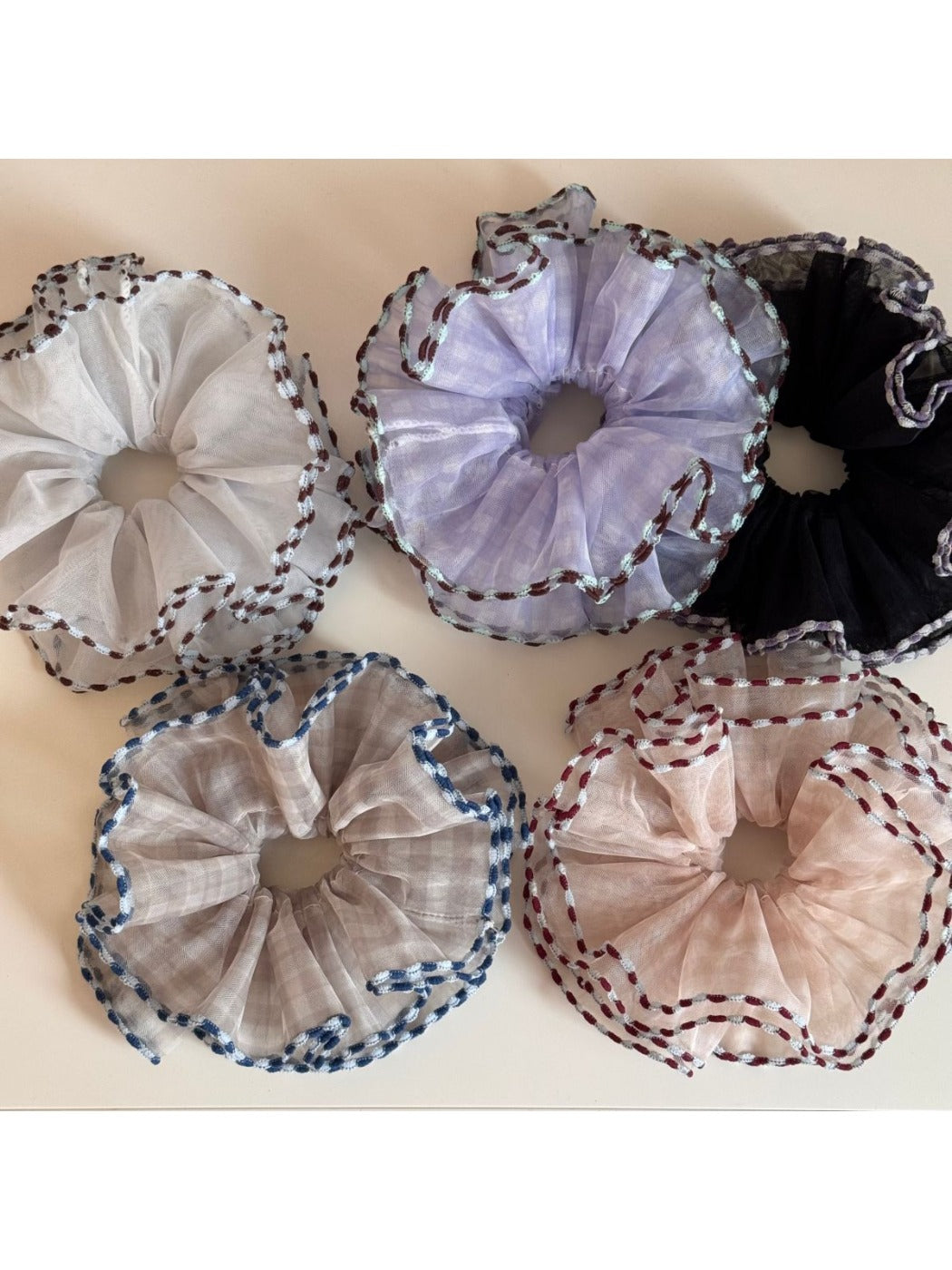 Gifty tulle scrunchie showing layered color block design and soft texture