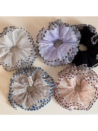 Gifty tulle scrunchie showing layered color block design and soft texture