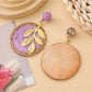 Earedge round leaf pendant earrings displayed on white background