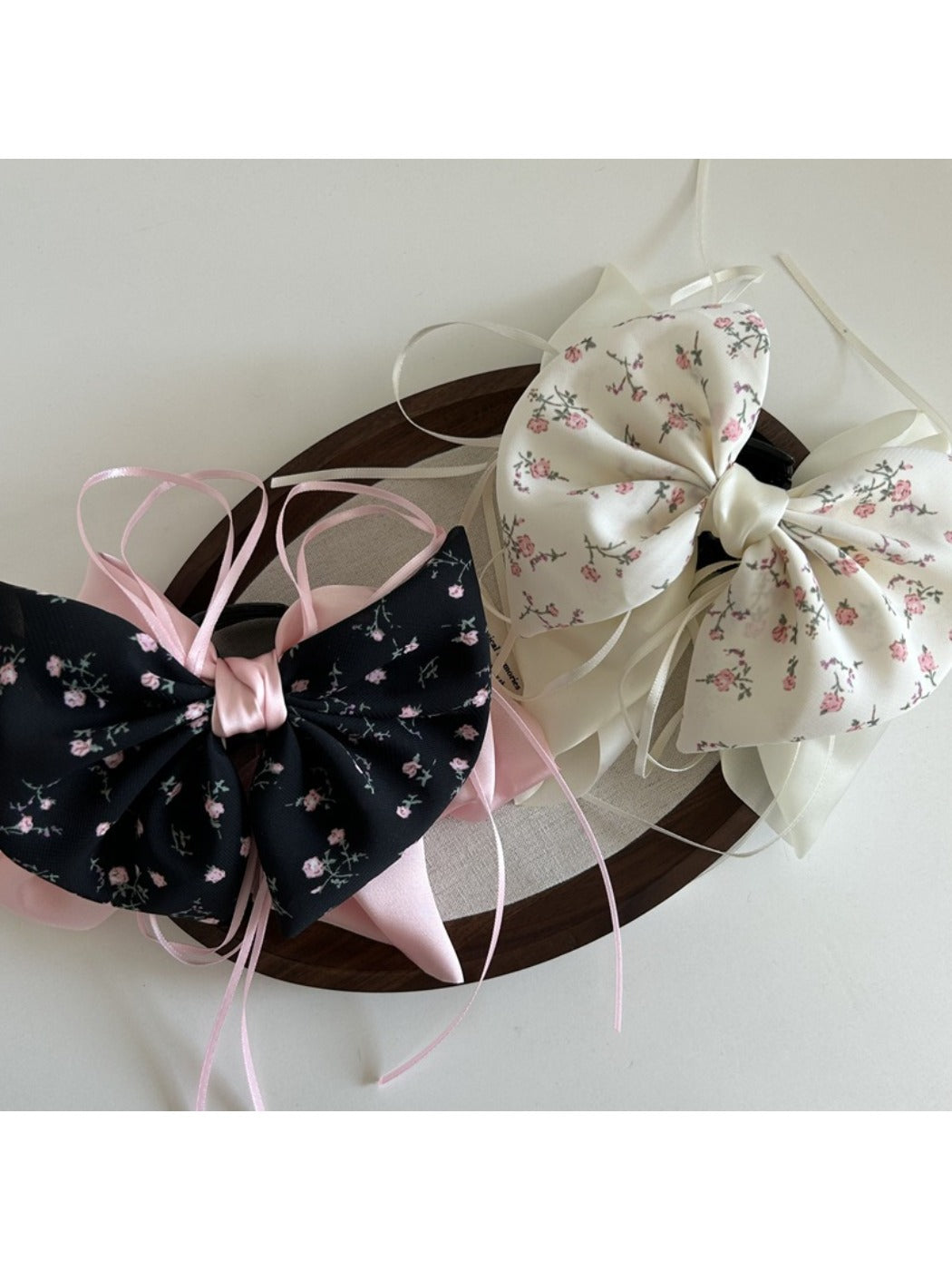 Close-up of Beau Sweet Tiny Floral Bow Claw Clip highlighting floral pattern