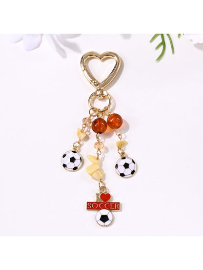 Detailed shot of the stitching and material on the sports ball pendant