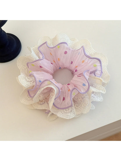 Gifty scrunchie packaged in a clear plastic bag with branding label