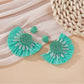 Earedge minimalist fan shaped drop earrings with focus on the clasp mechanism