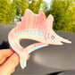 Beau claw clip open showing inner spring and claw details