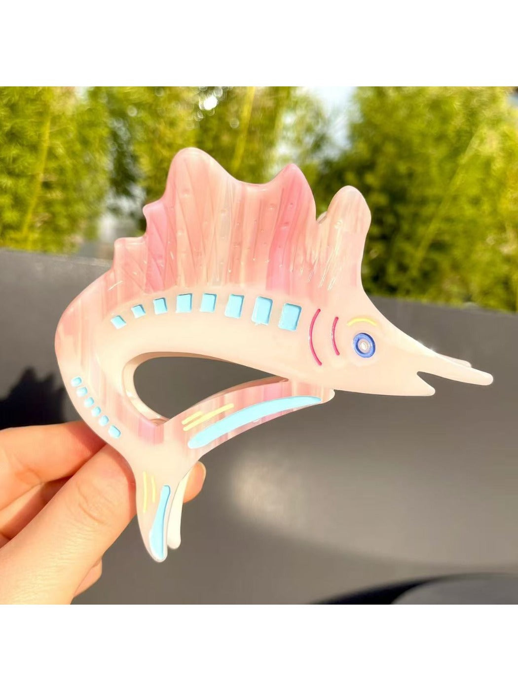 Beau claw clip open showing inner spring and claw details