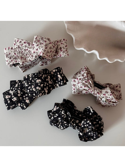 Beau small bow hair clip with pink and white floral print on fabric