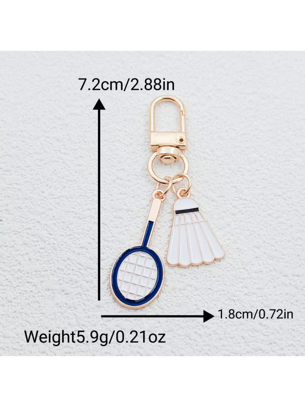 Top view of alloy badminton shuttlecock keychain highlighting feather design