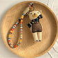 Keypus cartoon doll keychain with metal clasp and colorful fabric design
