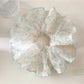 Gifty sweet vintage printed scrunchie with floral pattern on light fabric