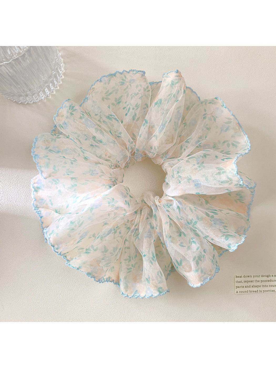 Gifty sweet vintage printed scrunchie with floral pattern on light fabric