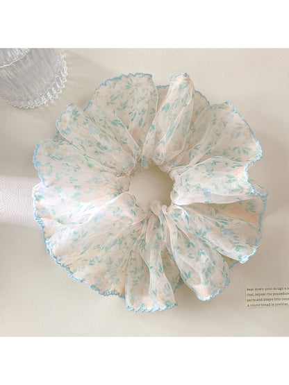 Gifty sweet vintage printed scrunchie with floral pattern on light fabric