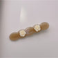 Beau hair clip styled in wavy hair to show usage and appearance