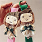 Close-up of colorful fabric patchwork woven strap attached to metal keyring