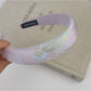 Close-up of stitching and fabric quality on Gifty embroidered flower headband
