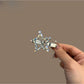 Close-up of Beau rhinestone five point star hair clip with sparkling clear stones