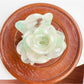Beau flower-shaped claw clip in matte finish with visible spring clasp detail