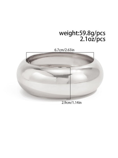 Lovra wide band bangle bracelet styled with layered bracelets