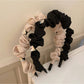 Close-up of Gifty heart shape rhinestone headband with sparkling clear stones