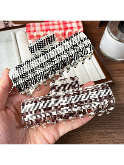 Close-up of Beau plaid fabric pattern on the updo claw clip