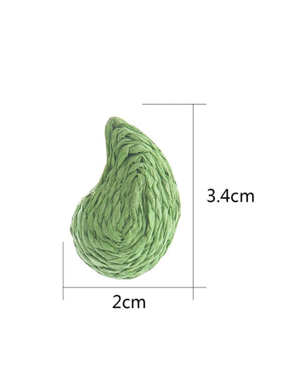 Side view of raffia water drop shaped stud earrings showing texture and shape