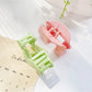 Side view of Beau solid color arched hair claw clip highlighting smooth finish