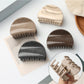Beau simple half circle hair clip in matte gold on white background