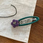 Beau hair clip featuring colorful floral print and silver metal clip