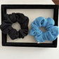 Gifty Lazy Style scrunchie worn on a wrist, highlighting its soft texture and design