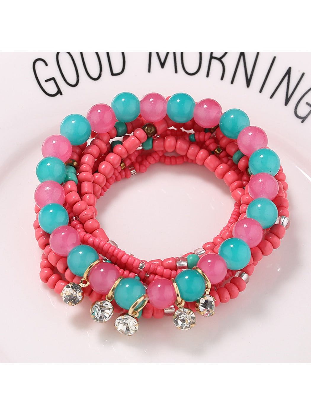 Lovra rhinestone pendant bracelet displayed with focus on bead colors and pendant