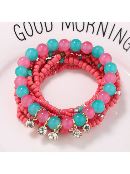 Lovra rhinestone pendant bracelet displayed with focus on bead colors and pendant