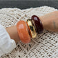 Side view of Lovra modern wide fit silver bracelet on wrist