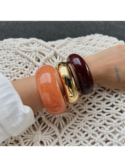 Side view of Lovra modern wide fit silver bracelet on wrist