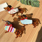 Beau dachshund claw clip held in hand demonstrating size and grip