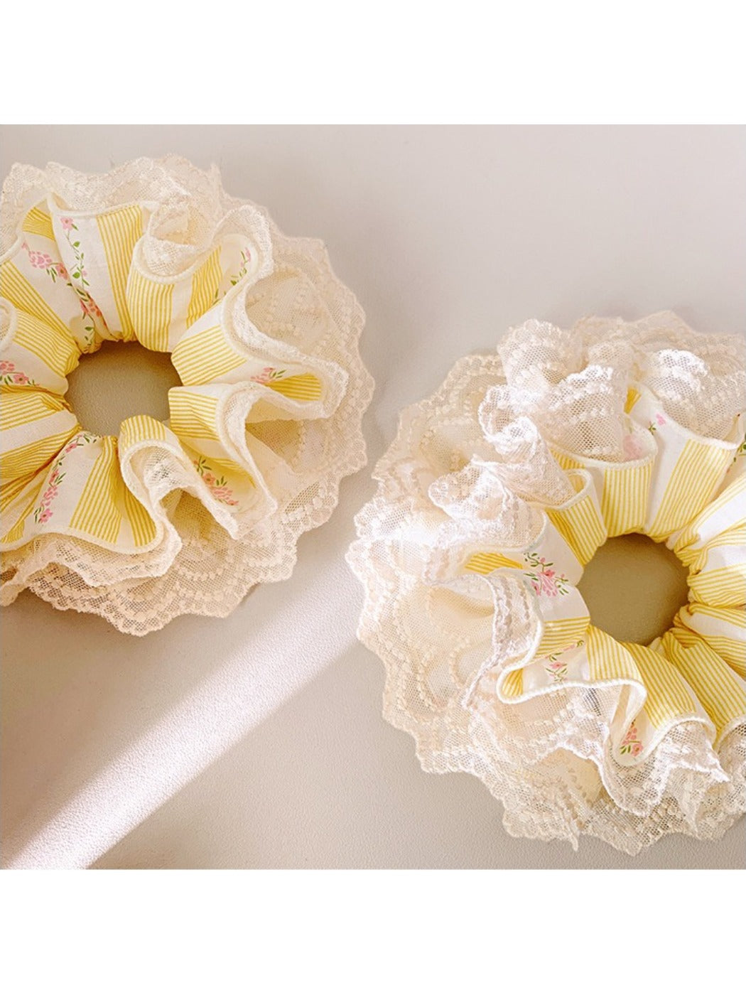 Yellow double layer lace scrunchie displayed flat with visible layers