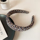 Gifty headband folded to display inner lining and fabric quality