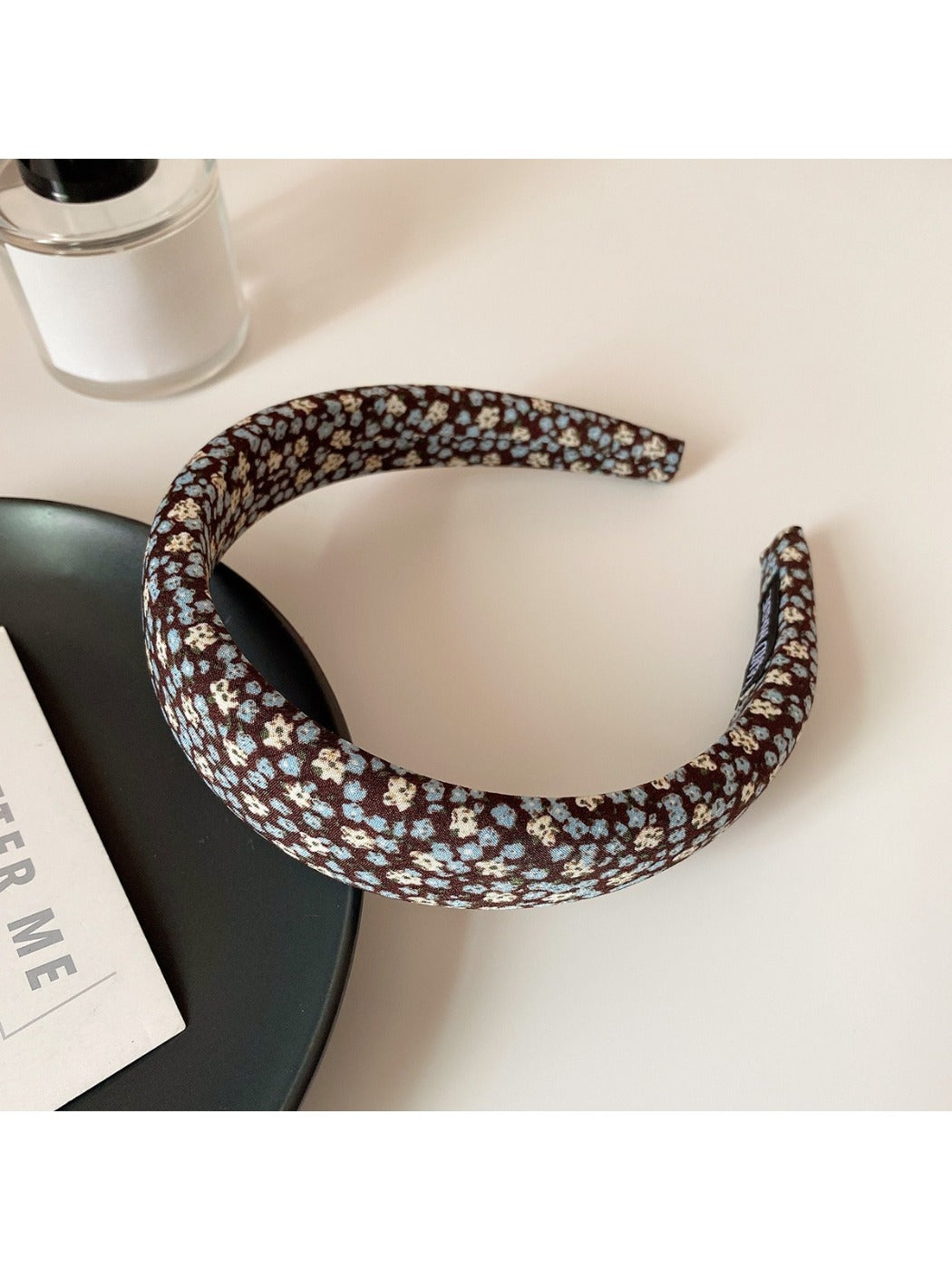 Gifty headband folded to display inner lining and fabric quality
