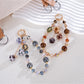 Keypus - Plush Pom-Pom Beaded Phone Strap