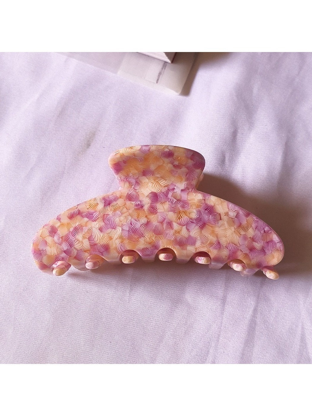 Beau tiny floral acetate claw clip with focus on floral print and colors
