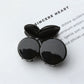 Beau cherry shaped claw clip viewed from above showing symmetrical design