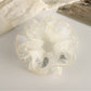 Gifty double layer scrunchie styled in a ponytail with ruffled fabric details