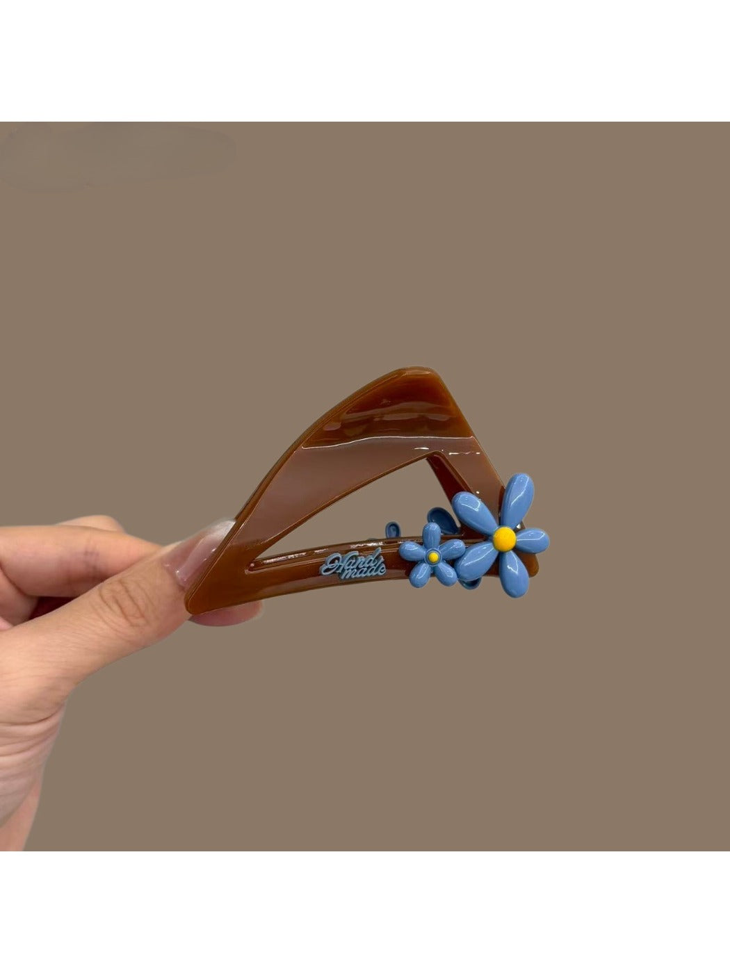 Beau hair claw clip holding hair in a half-up style on a model