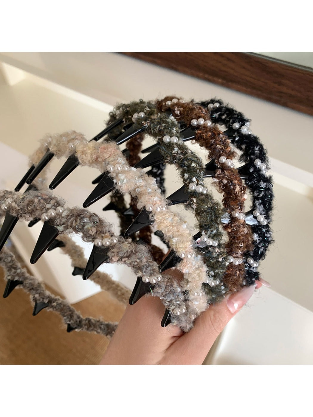 Close-up of Gifty fluffy headband showing plush texture and bow detail