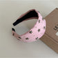 Side view of Gifty star decoration headband showing star details