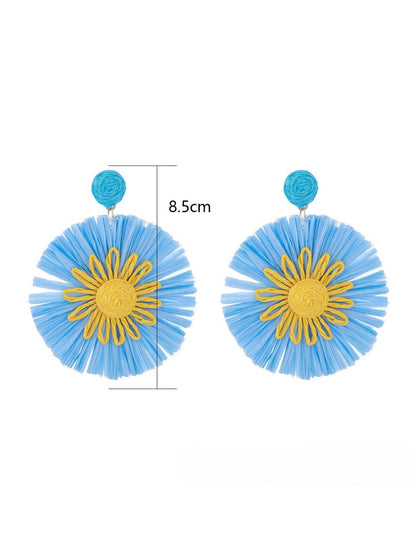 Side view of sunflower shaped earrings showing layered petals and stud backing
