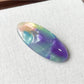 Beau Sweet Oval Acetate Hair Clip in natural light on a fabric background